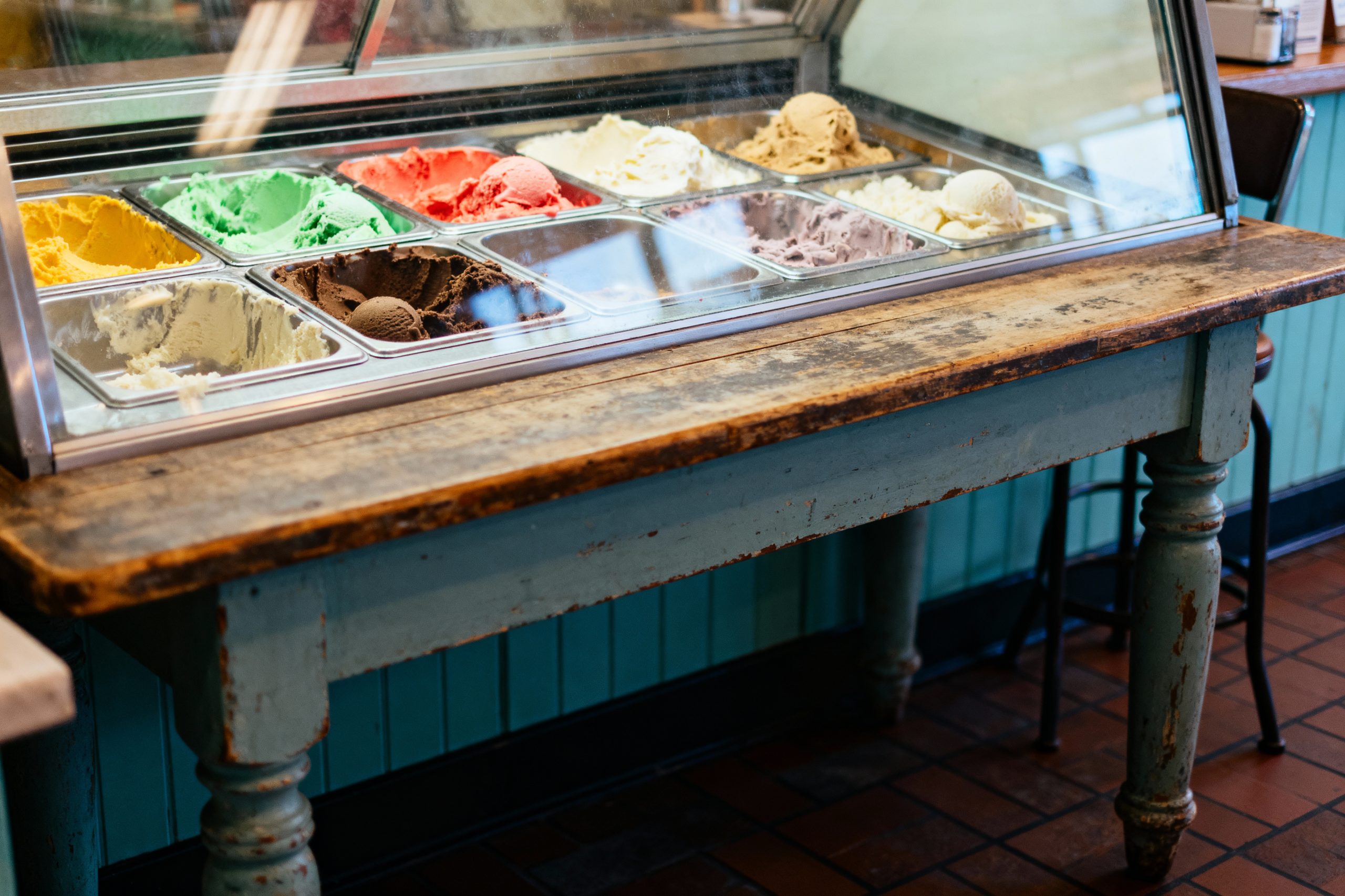 why did antique ice cream tables have glass displays