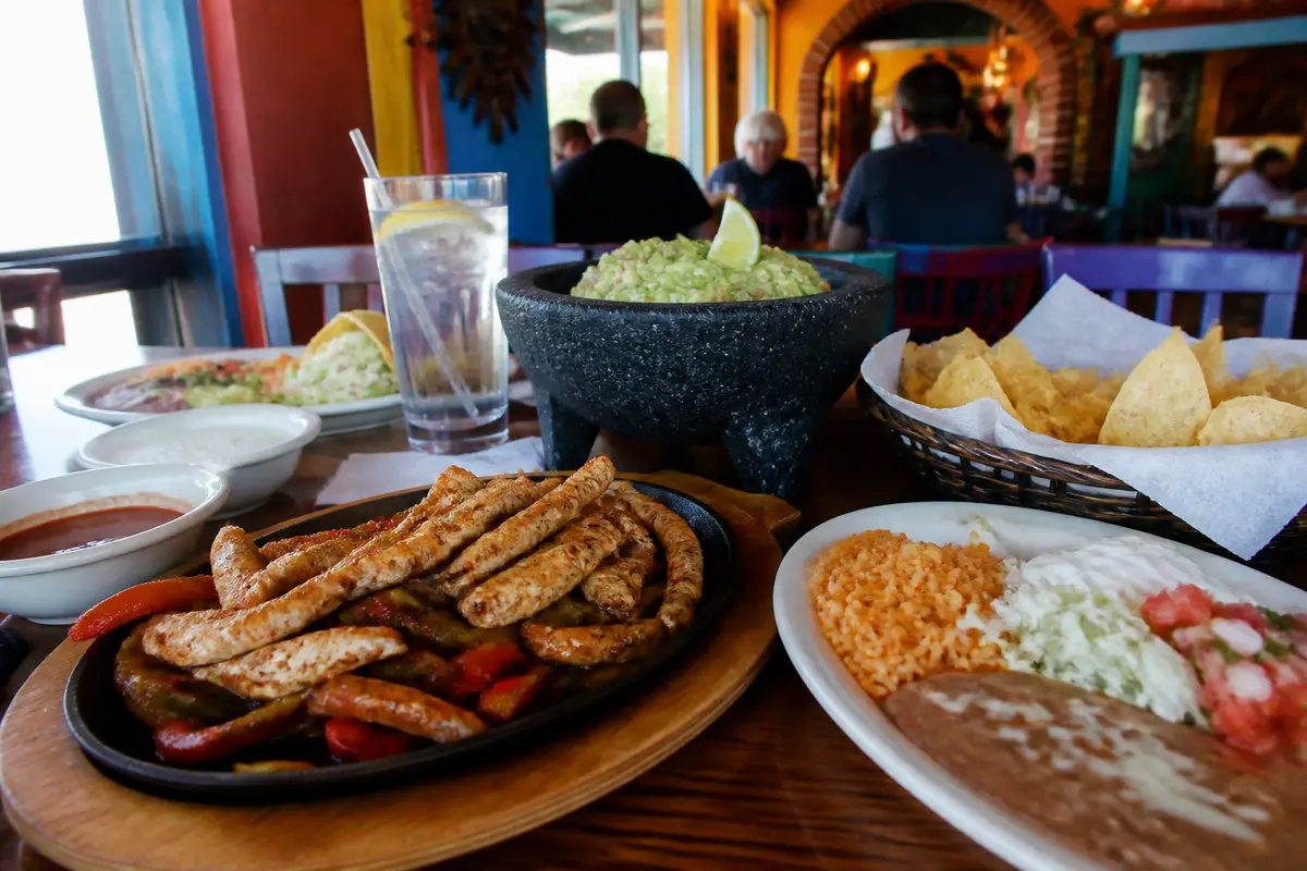 Mexican food with fajitas, guacamole, and chips at Casa Tequila in Pewaukee restaurant
